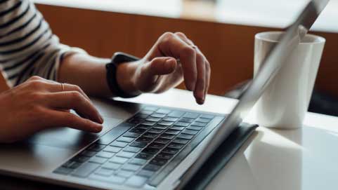 Typing On Laptop