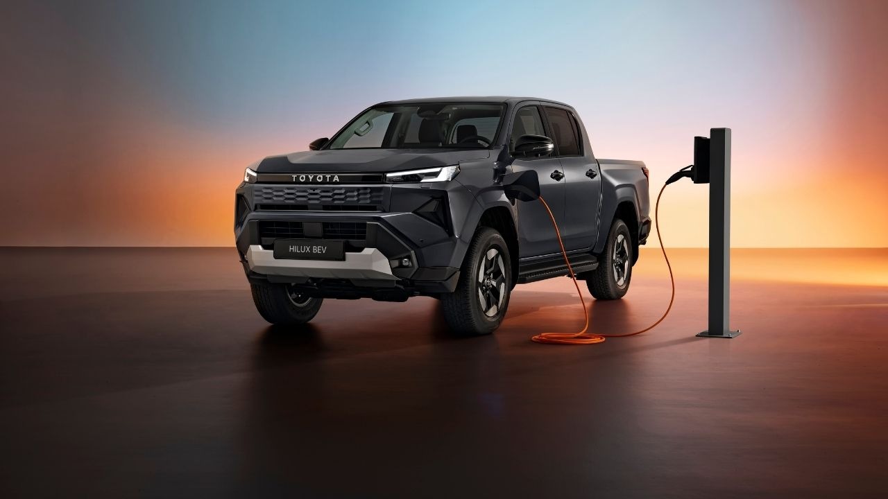 Black Toyota Hilux Pickup Truck Charging